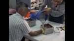 Shuttle: Astronaut Mullane Glove molding at Boeing